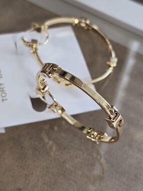 Tory Burch Polished Gold Hinged Logo Bracelet